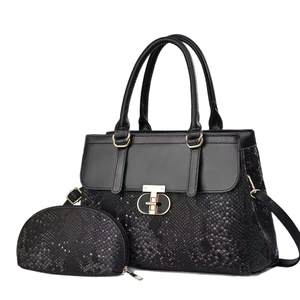Black snake texture tote bag with gold GD buckle and matching small coin purse