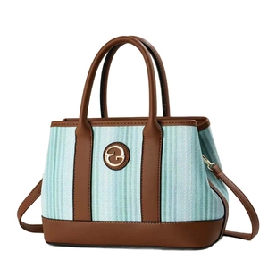 Sac à main bicolore à rayures bleues avec poignées en cuir marron et bandoulière