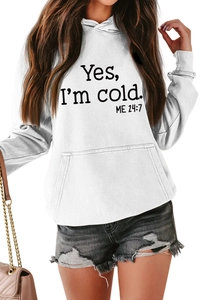 Detail of white hoodie featuring black Yes I'm cold ME 24:7 slogan print design