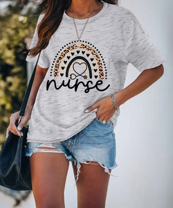 Detail of grey nurse T-shirt with leopard print rainbow and stethoscope heart design