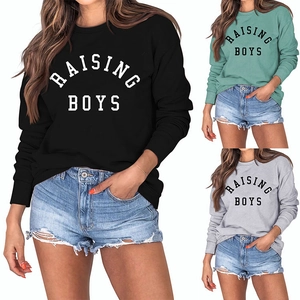 Detailed collage of crewneck sweatshirts with RAISING BOYS print in black, green, and grey