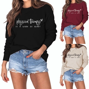 Detail of physical therapy lettering and heart print on long sleeve sweatshirts