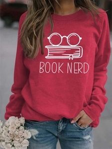 Close-up of Book Nerd print and glasses graphic on red long-sleeve cotton sweatshirt
