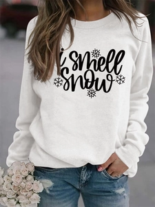 Detail of I smell Snow text print on women white crewneck long sleeve sweatshirt