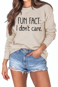 Detail of crew neck sweatshirt with Fun Fact I Don't Care slogan and clear fabric texture