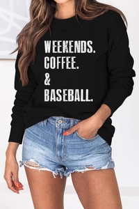Detail of WEEKENDS COFFEE BASEBALL lettering on black oversized crewneck sweatshirt