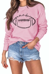 Vue détaillée du sweat-shirt rose à manches longues avec motif imprimé game day