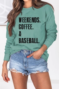 Detail of WEEKENDS COFFEE & BASEBALL vintage print on olive green sweatshirt