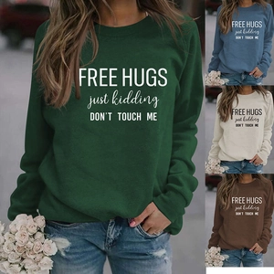 Detail of Free Hugs slogan print on long sleeve crewneck sweatshirt for women