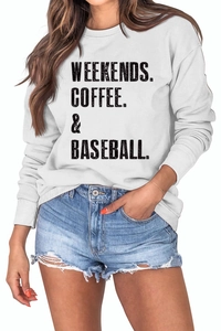 Close-up of Weekends Coffee Baseball text print on white long sleeve sweatshirt fabric