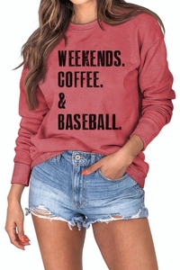 Detail of red crewneck sweatshirt featuring Weekends Coffee & Baseball print design