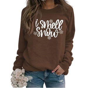 Brown crewneck sweatshirt featuring white I Smell Snow graphic and ribbed cuffs