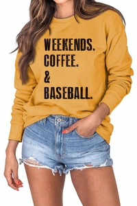 Close-up of mustard yellow sweatshirt featuring bold black WEEKENDS COFFEE BASEBALL print