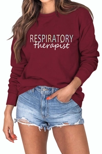Detail showing Respiratory Therapist print on wine red long sleeve crewneck sweatshirt