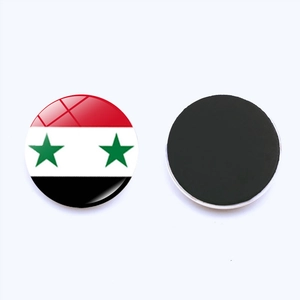 Close-up of Syria flag glass magnet with glossy surface and black magnetic backing base