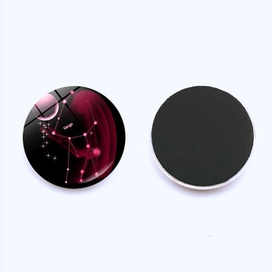 Front and back detail of Virgo zodiac round glass fridge magnet with nebula pattern