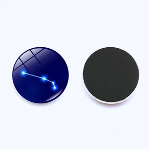 Front and back detail of 30mm glass fridge magnet with glowing zodiac constellation pattern
