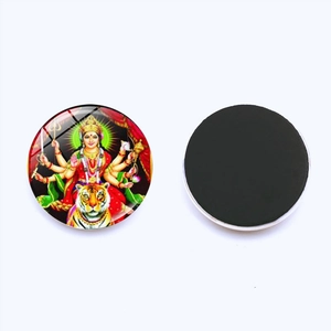 Detail view of 25mm Hindu Goddess Durga glass fridge magnet showing front and magnetic back