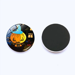 Detail of Halloween pumpkin fridge magnet with star wizard hat and magnetic back