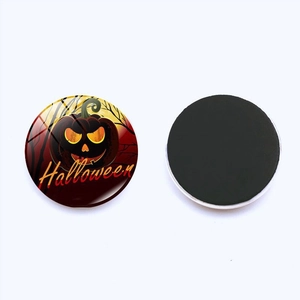 Halloween pumpkin glass fridge magnet with glowing design and magnetic backing