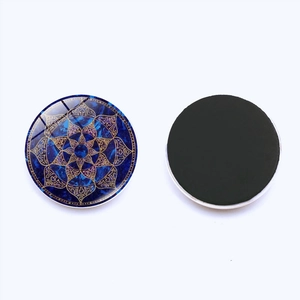 Detailed front and back view of a 30mm blue and gold mandala glass fridge magnet