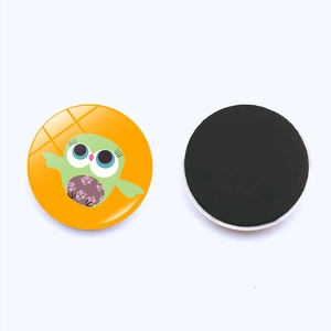 Round orange owl glass magnet with glossy finish and strong black magnetic back