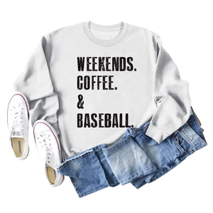 Flat lay of white crewneck sweatshirt with Weekends Coffee Baseball text and blue jeans