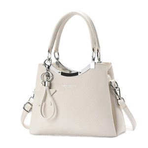Elegant off-white lychee leather shoulder bag with star charm and silver hardware accents