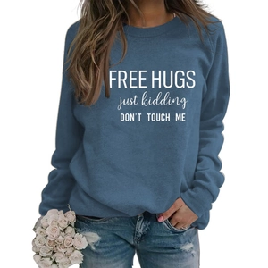 Detail of the blue-grey sweatshirt with white printed humorous slogan text for casual style