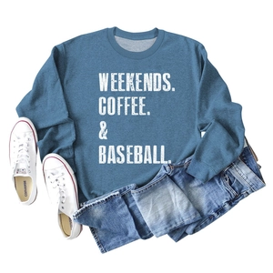 Flat lay of a blue Weekends Coffee Baseball sweatshirt styled with jeans and sneakers