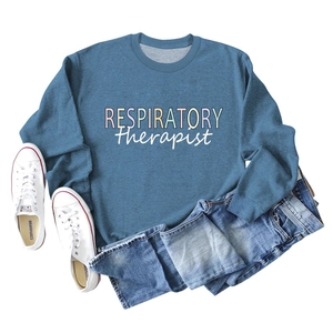 Flat lay of blue Respiratory Therapist sweatshirt styled with jeans and canvas shoes