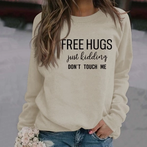 Cream long sleeve sweatshirt with Free Hugs Just Kidding letter print for women