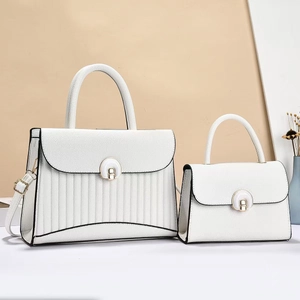 Detail of white striped stitching tote set with metal buckle and litchi grain texture