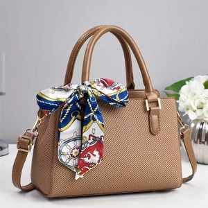 Brown woven texture handbag with silk scarf handle and adjustable crossbody strap
