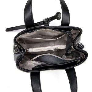 Top view of black leather handbag interior showing multiple compartments and grey lining