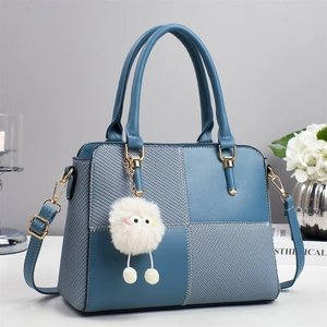 Blue patchwork handbag in minimalist Korean style with contrast weaving and plush charm