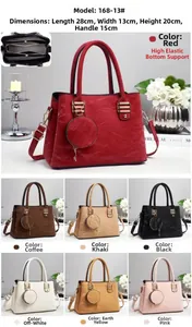 Detail view of large capacity tote bag with three compartments and matching round pouch charm