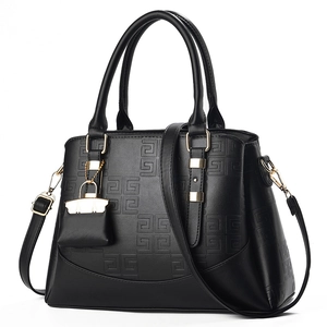 Sac à main noir en cuir avec motif géométrique et détails dorés élégants pour femmes