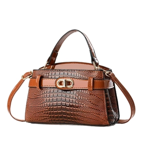 Brown crocodile texture handbag with gold buckle and adjustable strap for women