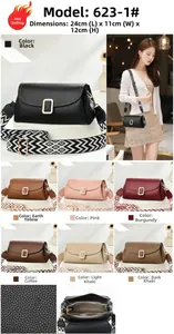Detailed views of crossbody bag with litchi texture and geometric patterned strap
