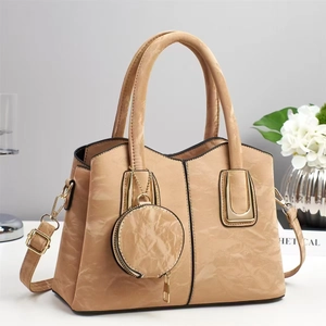 Minimalist beige pleated faux leather tote bag with round coin purse and gold hardware