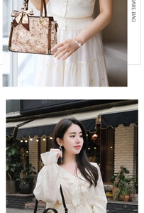 Detailed view of floral embroidery on retro handbag with silk scarf bow decoration