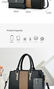 Vista dettagliata di dimensioni e capacità della borsa tote bicolore in pelle da 28 cm