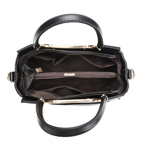 Black contrast tote bag with three compartments and brown lining interior view