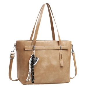 Brown faux leather tote bag with dual handles and crossbody strap on white background