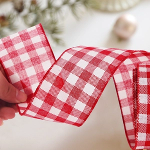 Detail of red and white plaid Christmas ribbon with high quality woven texture