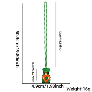 Detailed view of St. Patrick's Day green bead necklace with glittery gnome charm