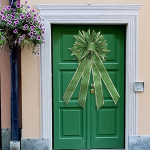 Grande fiocco verde glitterato di San Patrizio con bordo dorato sulla porta