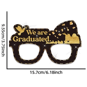 Detailed dimension view of black and gold paper graduation glasses 15.7cm by 9.55cm