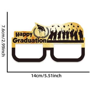 Detailed view of black and gold paper graduation glasses with Happy Graduation text